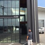 Large commercial sliding doors 21 ft tall warp free sliding doors lightweight stronger than steel 50 year guarantee